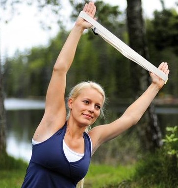 Relieve body tension by using the strap to maximise your stretch