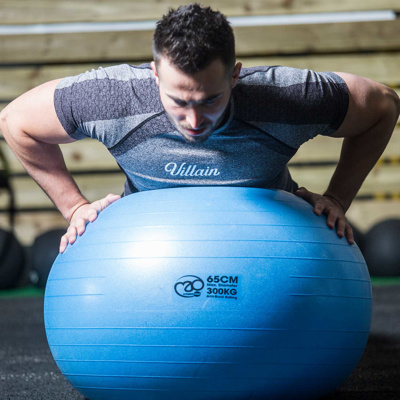 Man laying on his front on the Fitness-Mad 300kg Swiss Ball