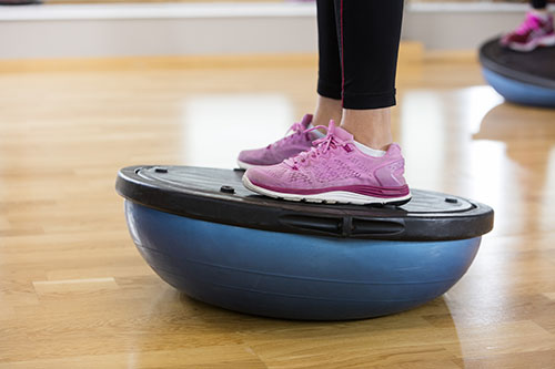 Bosu ball standing on balance training